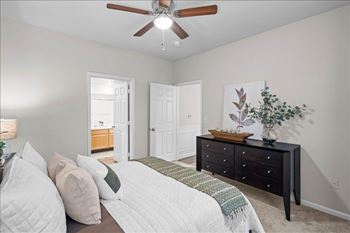 Cozy bedroom with bed and comforter